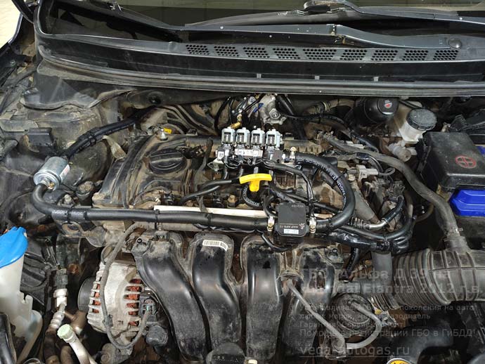 газовое оборудование Альфа Д 39 под капотом, установка на Хендай Элантра 2012 г.в., 1.8 л., 150 л.с., с пробегом 220 874 км., миниВЗУ в лючек бензобака, тороидальный баллон 54 литра в багажнике, в нише для запасного колеса, Нижний Новгород, Дзержинск